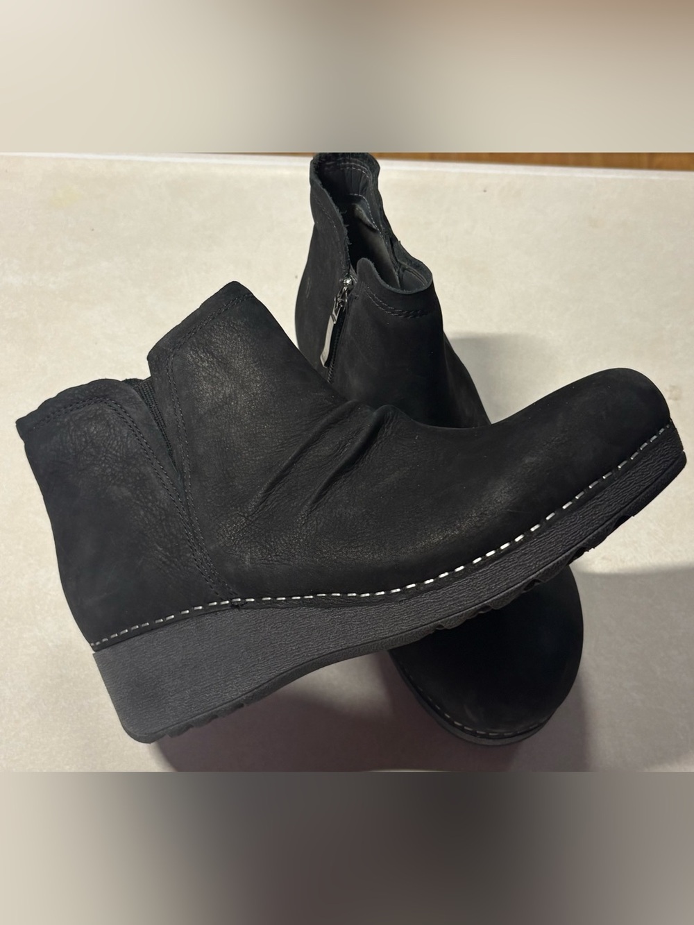 Dansko Women's Caley black ankle bootie